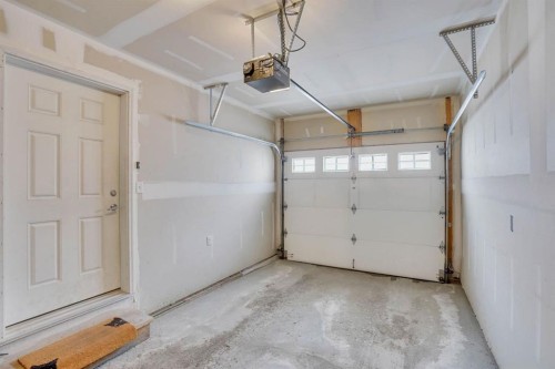 39 Panatella Road Nw, Calgary, AB - Indoor Photo Showing Garage