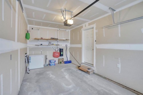 39 Panatella Road Nw, Calgary, AB - Indoor Photo Showing Garage