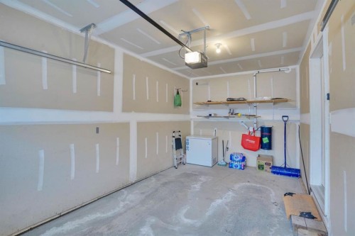 39 Panatella Road Nw, Calgary, AB - Indoor Photo Showing Garage