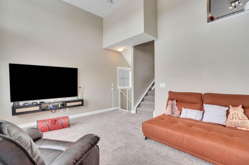39 Panatella Road Nw, Calgary, AB - Indoor Photo Showing Living Room