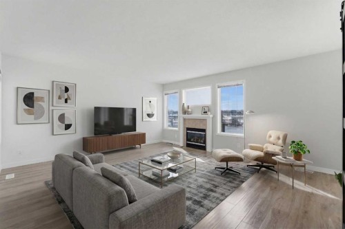 1-12 Silver Creek Boulevard Nw, Airdrie, AB - Indoor Photo Showing Living Room