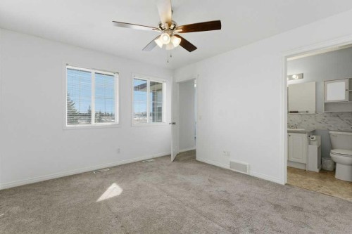 1-12 Silver Creek Boulevard Nw, Airdrie, AB - Indoor Photo Showing Other Room