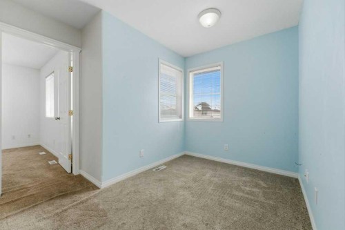 1-12 Silver Creek Boulevard Nw, Airdrie, AB - Indoor Photo Showing Other Room
