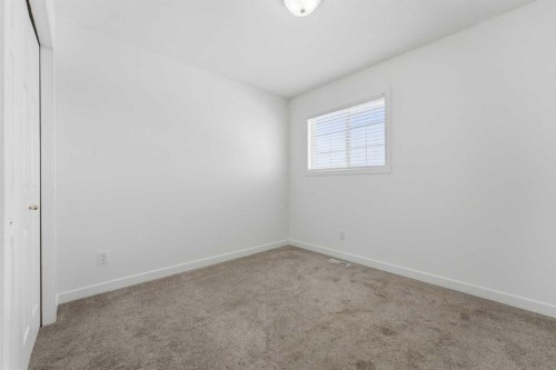 1-12 Silver Creek Boulevard Nw, Airdrie, AB - Indoor Photo Showing Other Room