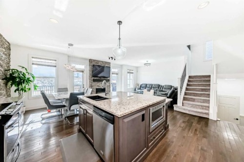 322 Reunion Green Nw, Airdrie, AB - Indoor Photo Showing Kitchen With Upgraded Kitchen