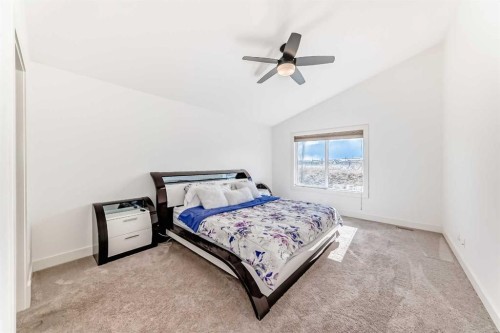 322 Reunion Green Nw, Airdrie, AB - Indoor Photo Showing Bedroom