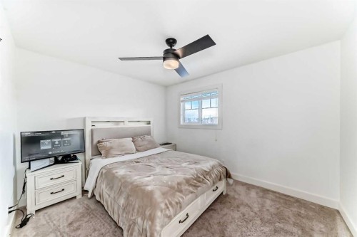 322 Reunion Green Nw, Airdrie, AB - Indoor Photo Showing Bedroom