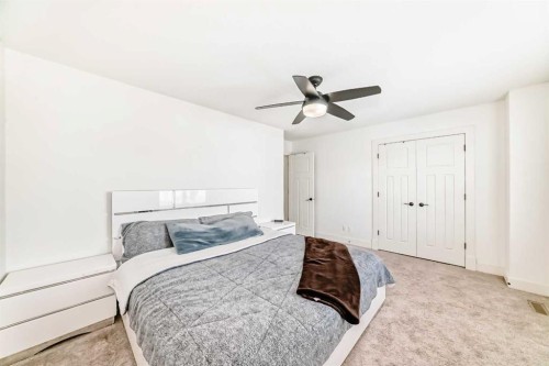 322 Reunion Green Nw, Airdrie, AB - Indoor Photo Showing Bedroom