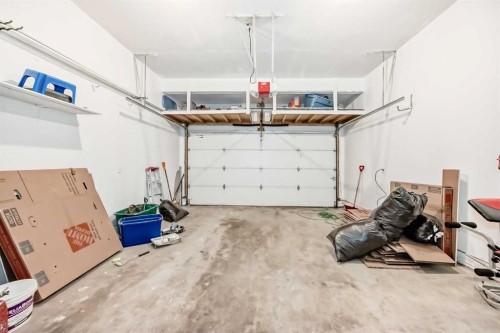322 Reunion Green Nw, Airdrie, AB - Indoor Photo Showing Garage