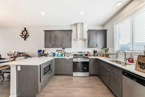 948 West Lakeview Drive, Chestermere, AB - Indoor Photo Showing Kitchen With Double Sink With Upgraded Kitchen