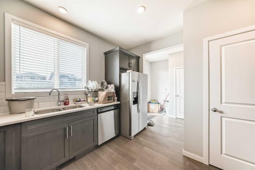 948 West Lakeview Drive, Chestermere, AB - Indoor Photo Showing Kitchen With Double Sink
