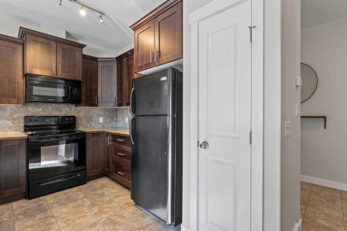 420 Ranch Ridge Meadow, Strathmore, AB - Indoor Photo Showing Kitchen
