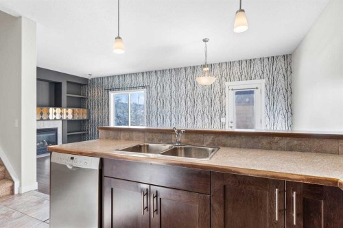 420 Ranch Ridge Meadow, Strathmore, AB - Indoor Photo Showing Kitchen With Double Sink