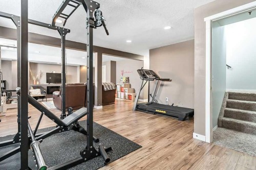 1724 4 Avenue Se, High River, AB - Indoor Photo Showing Gym Room