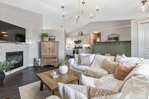1724 4 Avenue Se, High River, AB - Indoor Photo Showing Living Room With Fireplace