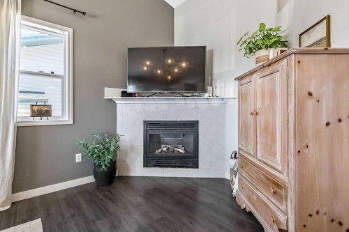 1724 4 Avenue Se, High River, AB - Indoor Photo Showing Living Room With Fireplace
