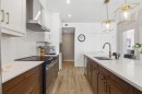 7306-1802 Mahogany Boulevard Se, Calgary, AB  - Indoor Photo Showing Kitchen With Double Sink With Upgraded Kitchen 