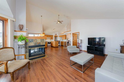 20 Somerset Drive Sw, Calgary, AB - Indoor Photo Showing Living Room With Fireplace