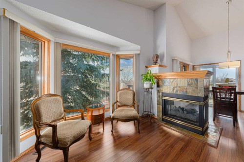 20 Somerset Drive Sw, Calgary, AB - Indoor Photo Showing Living Room With Fireplace
