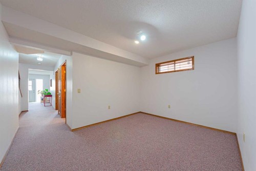 20 Somerset Drive Sw, Calgary, AB - Indoor Photo Showing Other Room