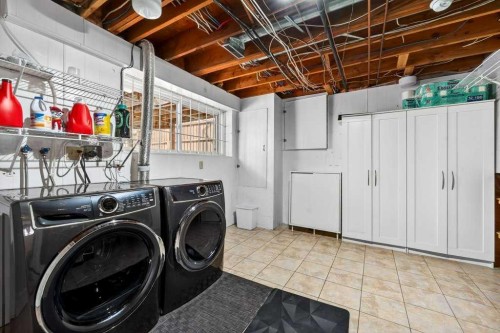96 Templehill Drive Ne, Calgary, AB - Indoor Photo Showing Laundry Room