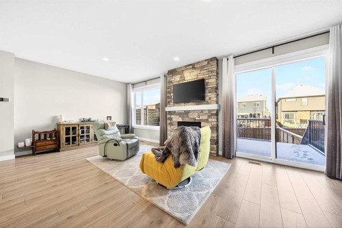 13 Cranbrook Close Se, Calgary, AB - Indoor Photo Showing Living Room With Fireplace