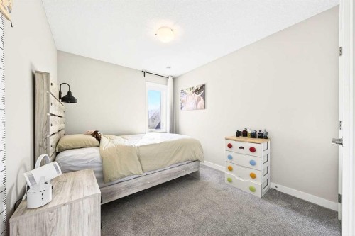 13 Cranbrook Close Se, Calgary, AB - Indoor Photo Showing Bedroom