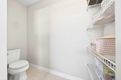 13 Cranbrook Close Se, Calgary, AB - Indoor Photo Showing Bathroom