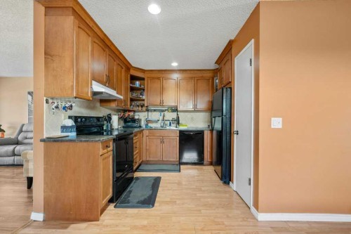 113 Ranch Glen Place Nw, Calgary, AB - Indoor Photo Showing Kitchen