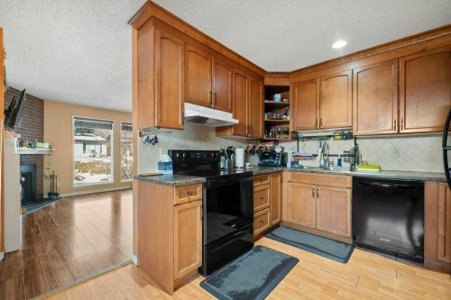 113 Ranch Glen Place Nw, Calgary, AB - Indoor Photo Showing Kitchen