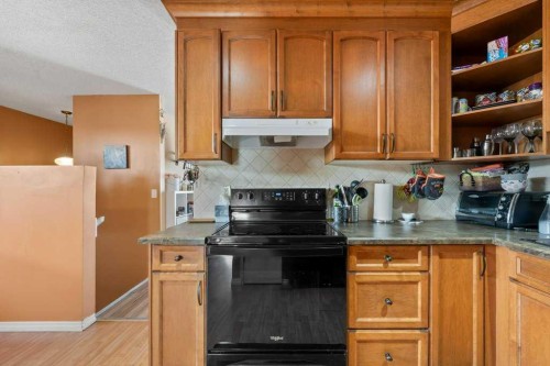 113 Ranch Glen Place Nw, Calgary, AB - Indoor Photo Showing Kitchen