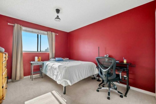 113 Ranch Glen Place Nw, Calgary, AB - Indoor Photo Showing Bedroom