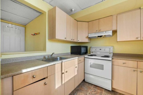 113 Ranch Glen Place Nw, Calgary, AB - Indoor Photo Showing Kitchen