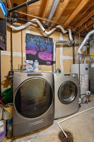 113 Ranch Glen Place Nw, Calgary, AB - Indoor Photo Showing Laundry Room