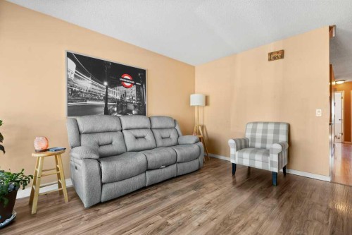 113 Ranch Glen Place Nw, Calgary, AB - Indoor Photo Showing Living Room