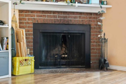 113 Ranch Glen Place Nw, Calgary, AB - Indoor Photo Showing Living Room With Fireplace