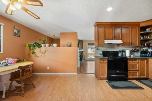 113 Ranch Glen Place Nw, Calgary, AB - Indoor Photo Showing Kitchen