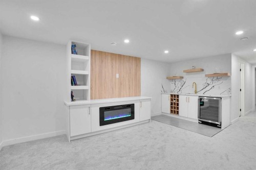 52 Franklin Drive Se, Calgary, AB - Indoor Photo Showing Other Room With Fireplace