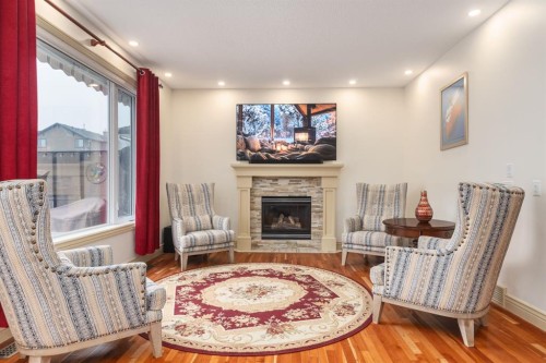 401 Marina Drive, Chestermere, AB - Indoor Photo Showing Living Room With Fireplace