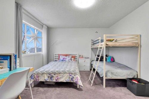 300 Copperstone Cove Se, Calgary, AB - Indoor Photo Showing Bedroom