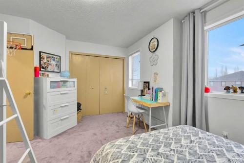 300 Copperstone Cove Se, Calgary, AB - Indoor Photo Showing Bedroom