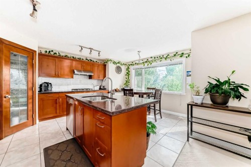 146 Scenic View Close, Calgary, AB - Indoor Photo Showing Kitchen With Double Sink