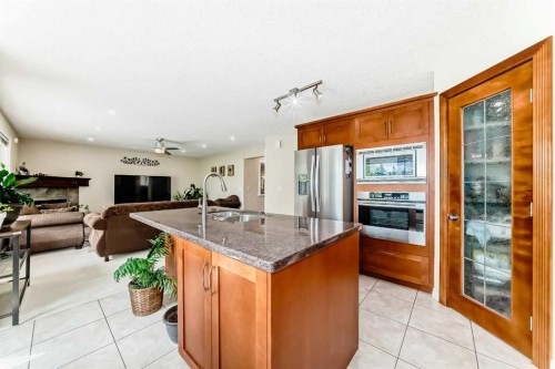 146 Scenic View Close, Calgary, AB - Indoor Photo Showing Kitchen With Double Sink