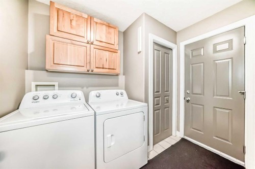 146 Scenic View Close, Calgary, AB - Indoor Photo Showing Laundry Room