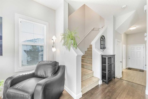 108 Jumping Pound Common, Cochrane, AB - Indoor Photo Showing Other Room