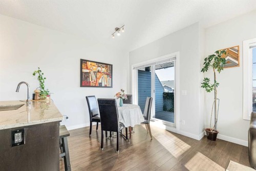 108 Jumping Pound Common, Cochrane, AB - Indoor Photo Showing Dining Room