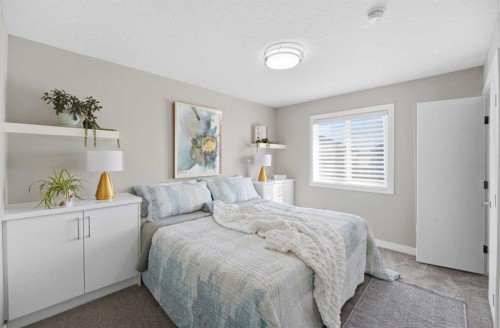 101 Ranch Rise, Strathmore, AB - Indoor Photo Showing Bedroom