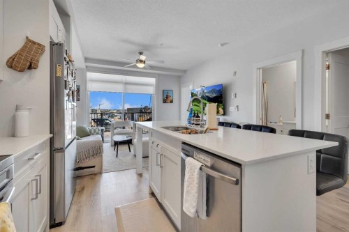 104-30 Sage Hill Walk Nw, Calgary, AB - Indoor Photo Showing Kitchen With Stainless Steel Kitchen With Upgraded Kitchen