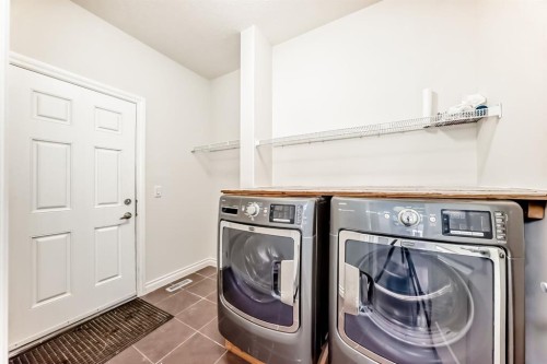 76 Saddlelake Green Ne, Calgary, AB - Indoor Photo Showing Laundry Room