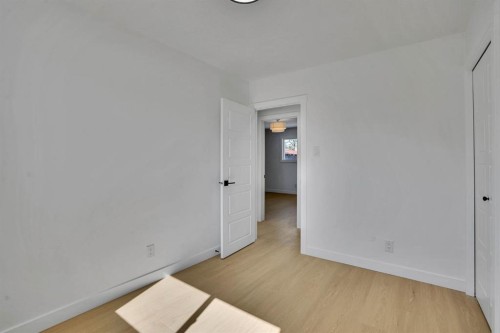 708 Sacramento Place Sw, Calgary, AB - Indoor Photo Showing Other Room